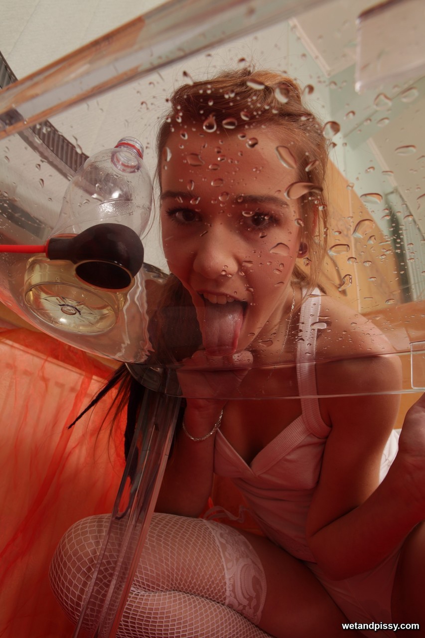 Teenage babe Liz takes a pee in a plastic bottle, drinks it and masturbates порно фото #428758053