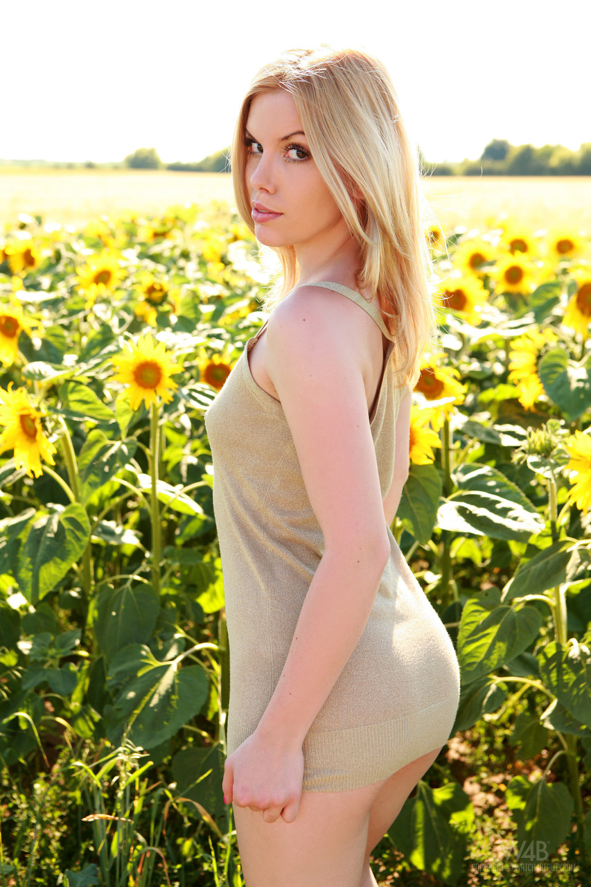 All-natural Slovak babe Kala Ferard stripping naked in a sunflower field porn photo #428687580