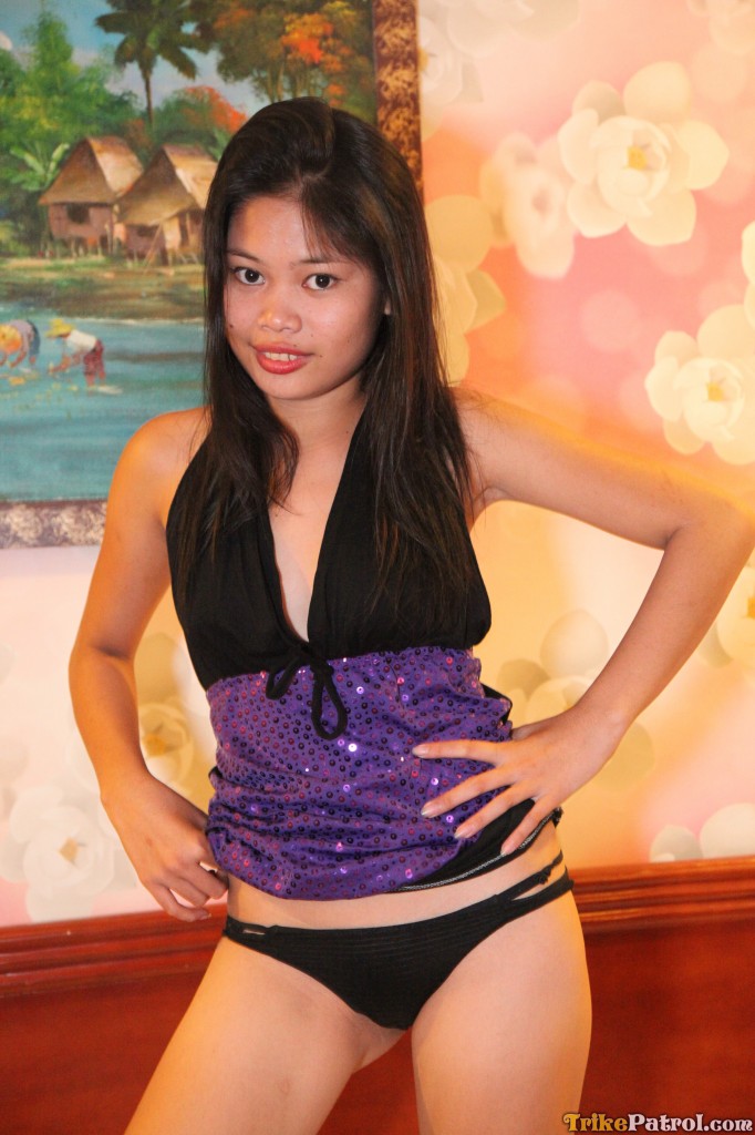 Filipina model Alona exhibiting her attractive breasts and vagina.