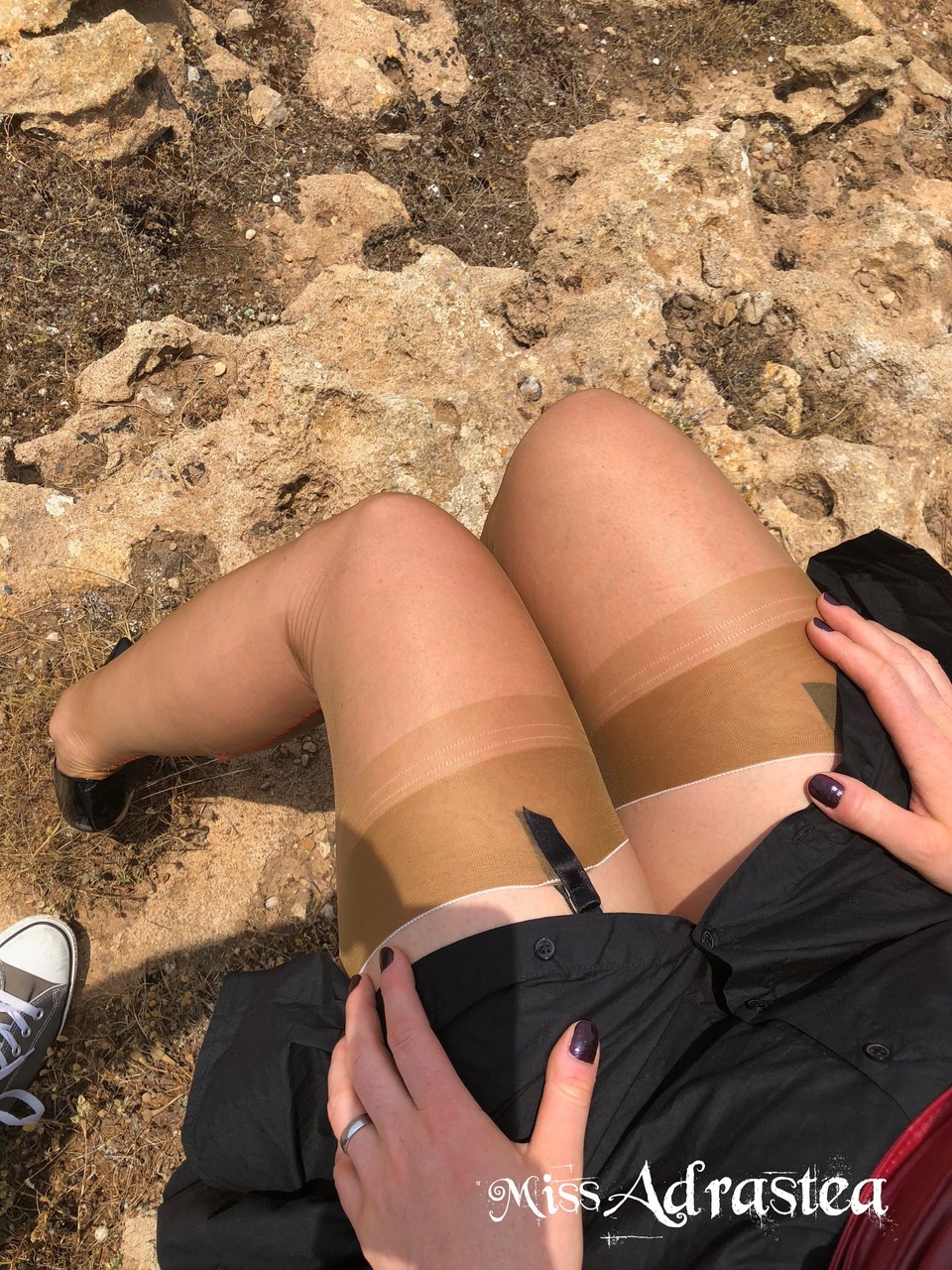 Seductive Milf Miss Adrastea Flaunts Her Sexy Legs In Her Stockings Outside