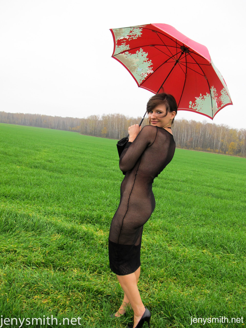 Brunette Milf Jeny Smith Posing In A Black Sheer Dress In Public