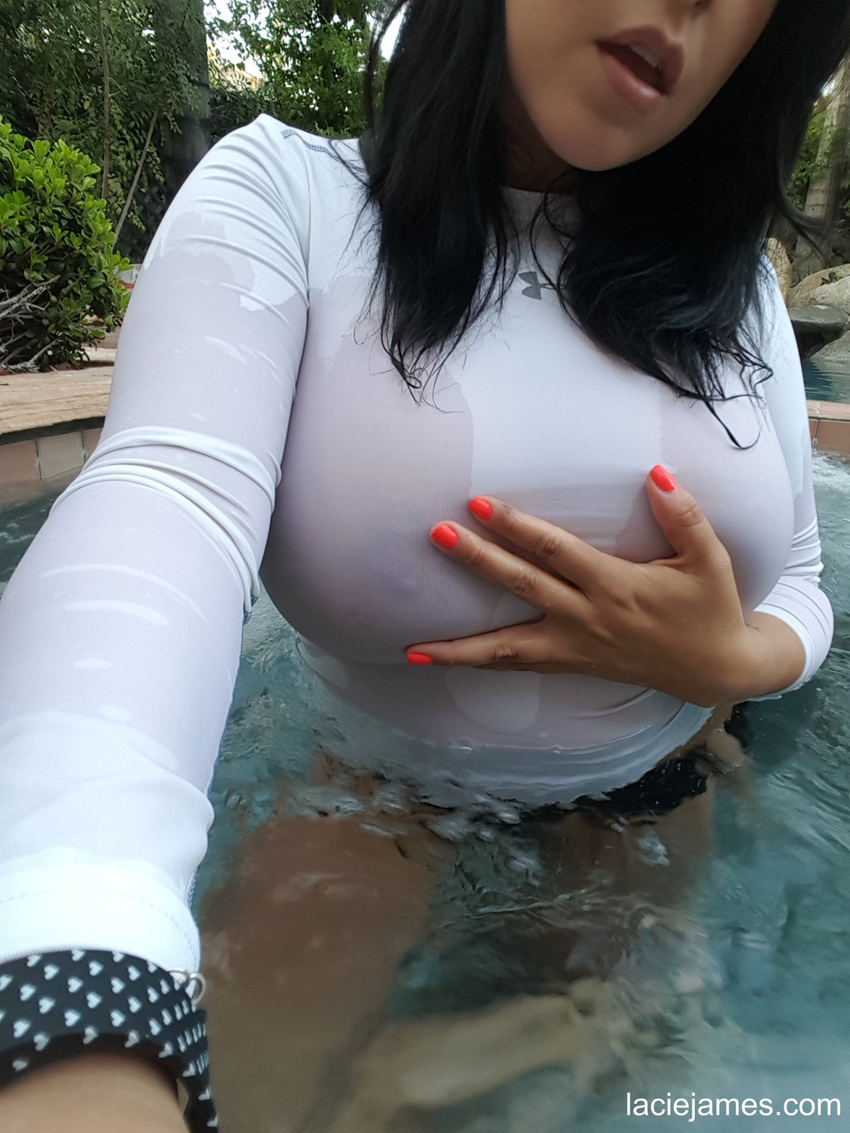 Brunette Milf Lacie James Shows Her Big Boobs While Taking Selfies In The Pool