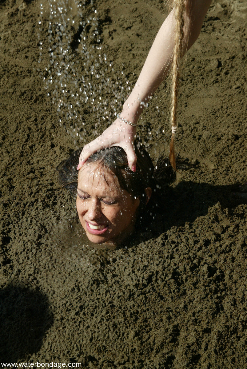 Bound slut with big boobs Sasha Sparks gets buried in mud by her lezdom foto porno #422854232