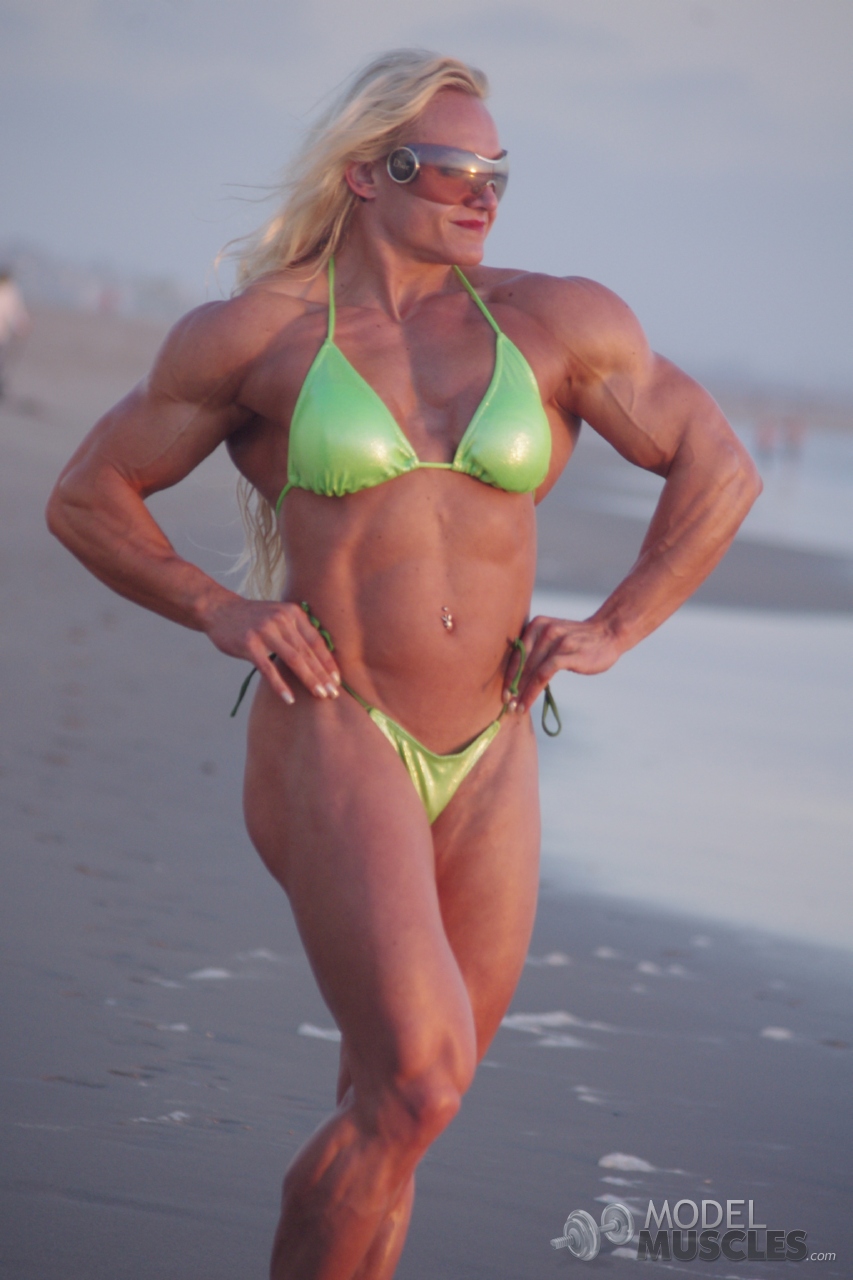 MILF bodybuilder Brigita Brezovac flexing her muscular body in a skimpy bikini porn photo #426724700