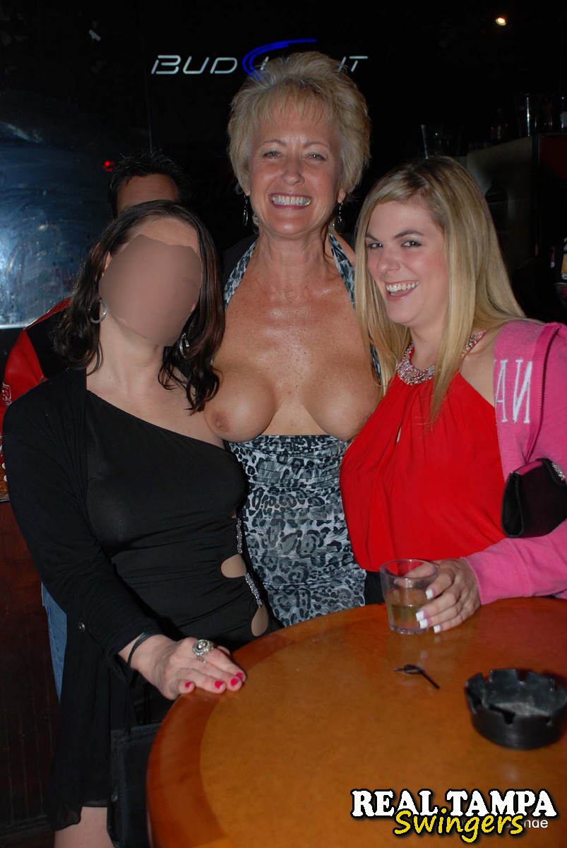Mature swinger Tracy Lick reveals her big juggs and gets blacked at a club porn photo #424047979