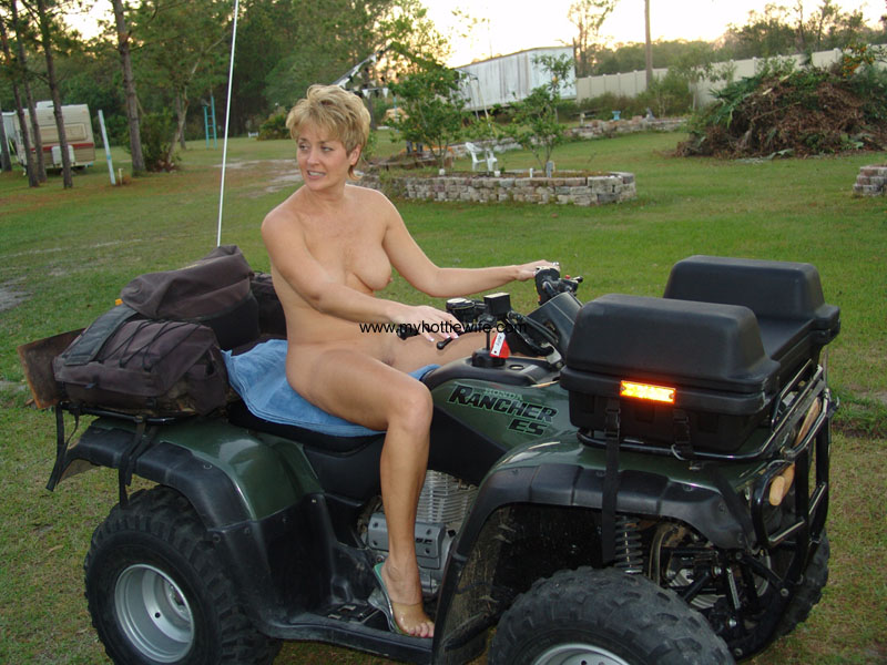 Amateur Swinger With Fake Tits Tracy Lick Poses Naked On A Fourwheeler