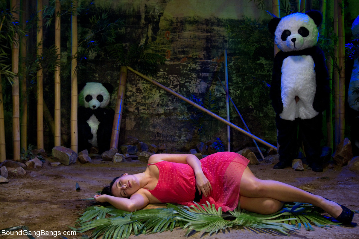 Ashli Orion gets face fucked by a bunch of men dressed in panda costumes foto porno #424865437