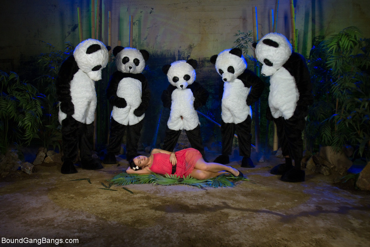 Ashli Orion gets face fucked by a bunch of men dressed in panda costumes porn photo #424865438