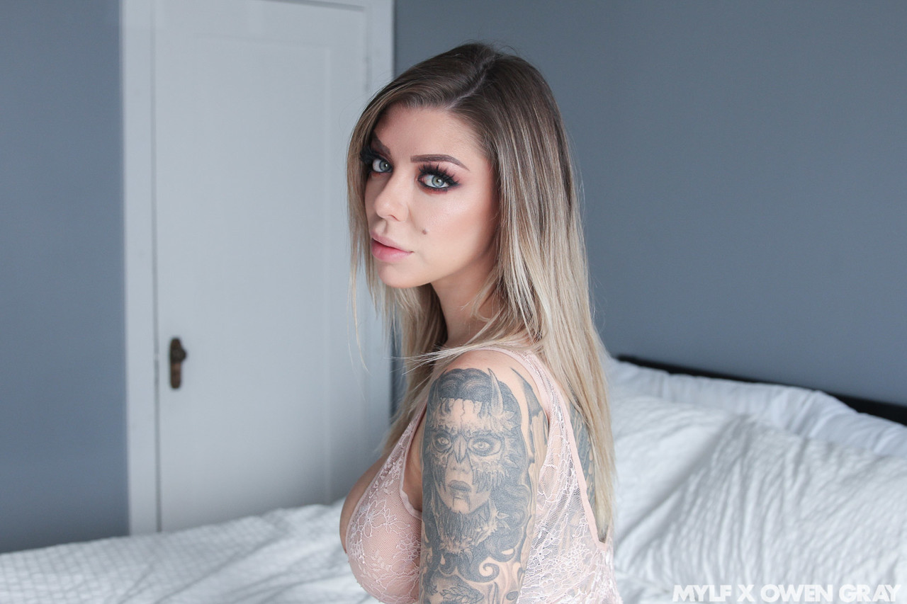 Tattooed MILF with grand boobs Karma RX rides a fat hard cock on a bed porn photo #426766439
