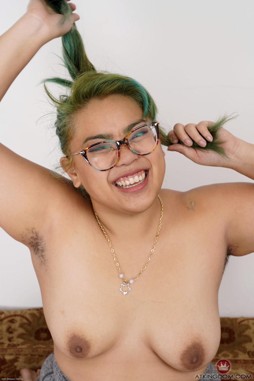 Asian sweetheart Manila Bey exhibits her oversized chest as she flaunts enormous abs.