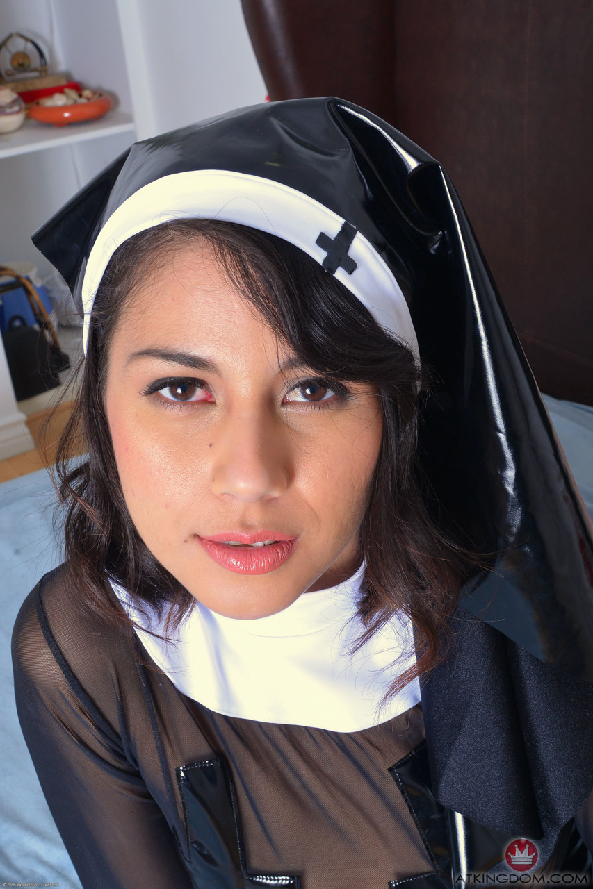 The attractive puma-like pussy of Penelope Reed is admired by the beautiful nun who puts her hair up close and personal.