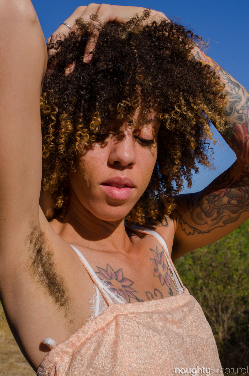 Exotic ebony Kendi Oh unveils her hairy tattooed body in nature photo porno #424649563