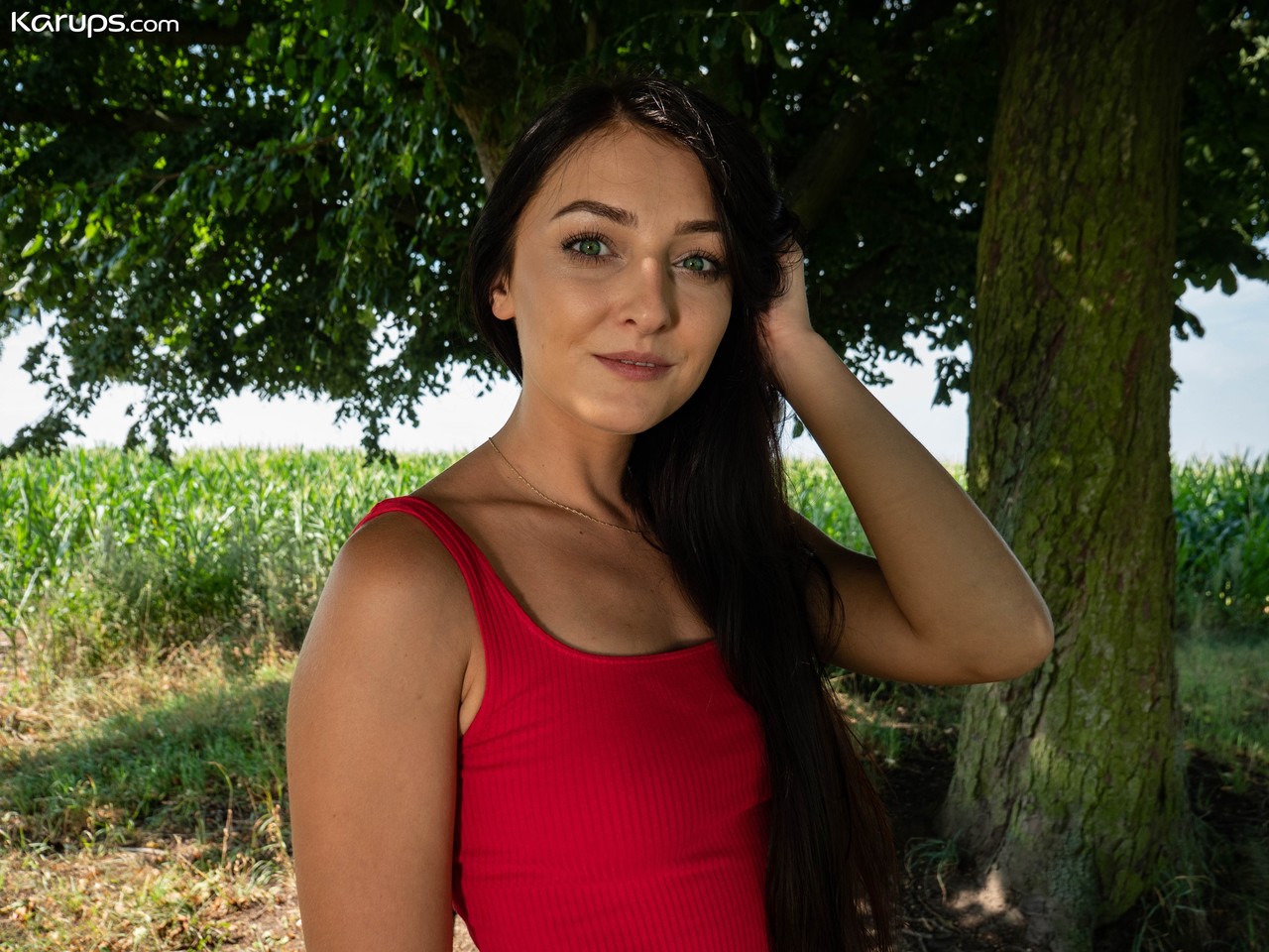 Czech teen Katy Rose masturbates outdoors on a bench underneath a tree