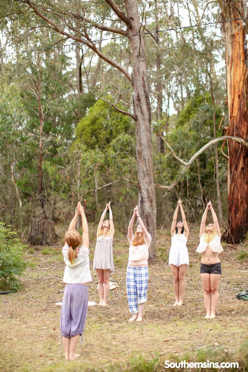 Gorgeous Australian girls practicing yoga in their hot outfits in nature porn photo #423874884