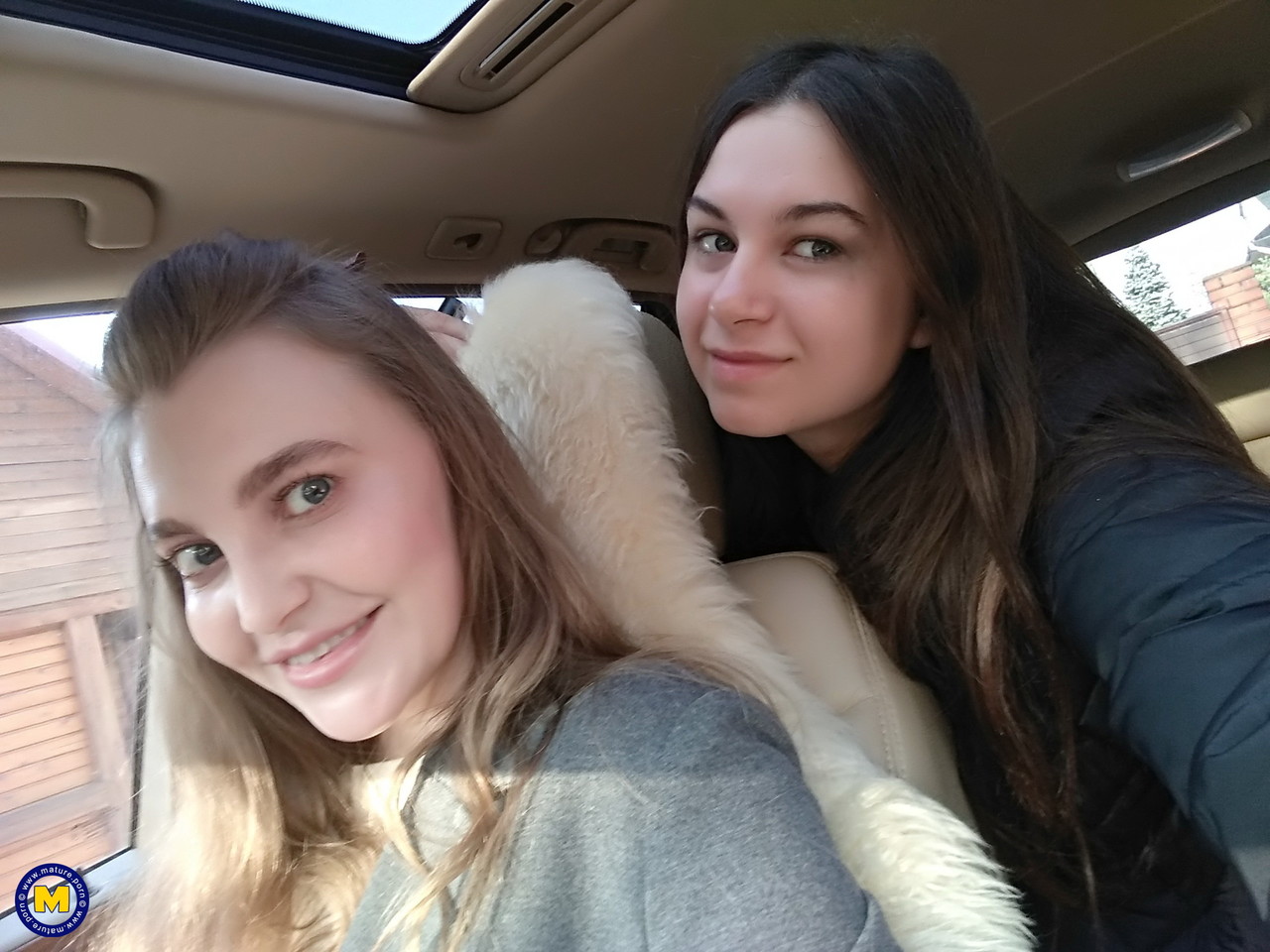 Long haired European lovers take a selfie in the car before lesbian sex action foto porno #427416561