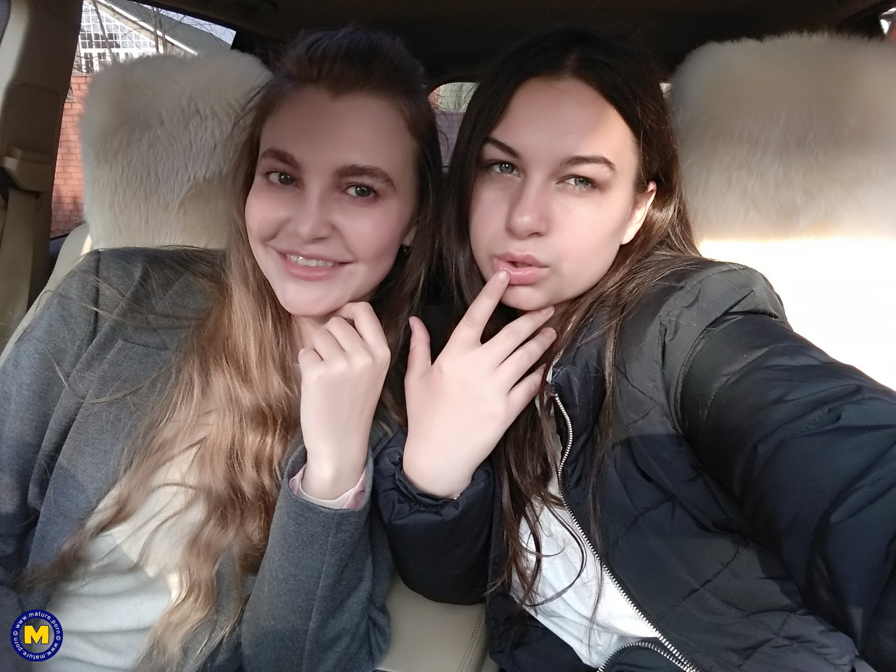 Long haired European lovers take a selfie in the car before lesbian sex action foto porno #427416601