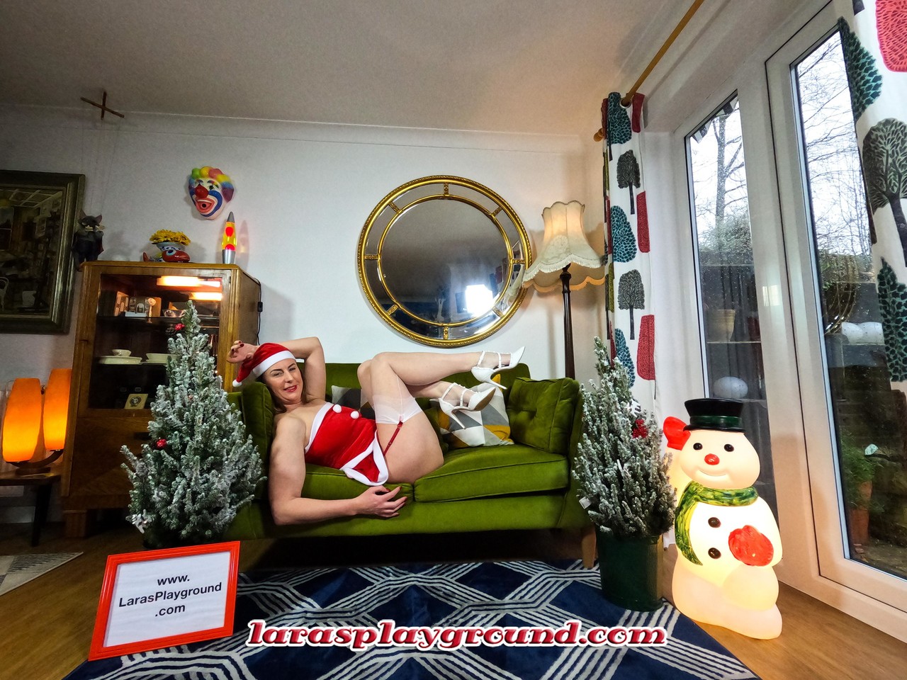 Blonde MILF Lara fingers herself while teasing in white stockings at Christmas porn photo #424914120