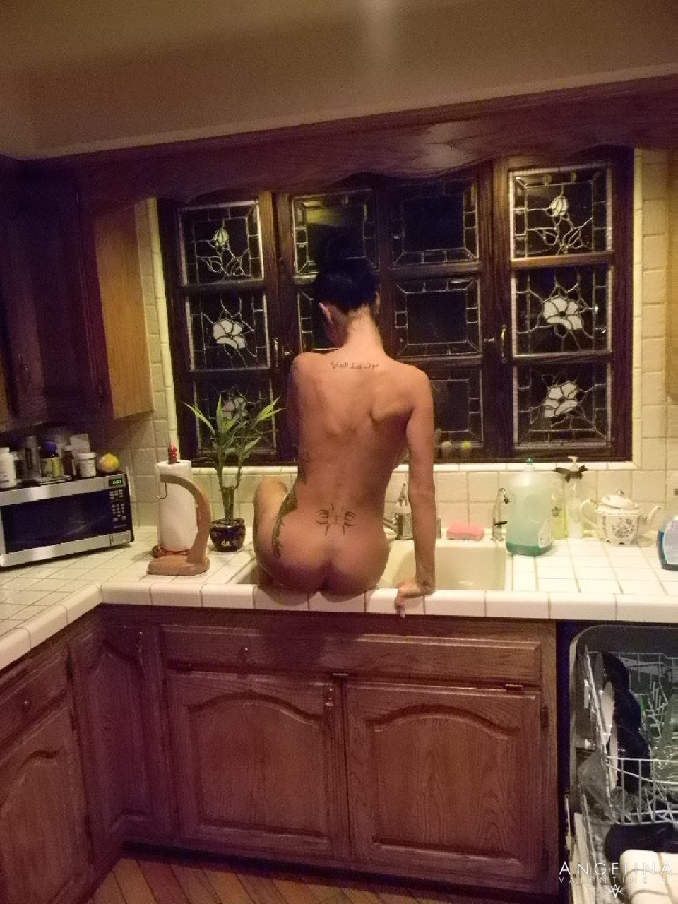 Huge titted babe Angelina Valentine enjoys creamy masturbation in the kitchen porn photo #422869439