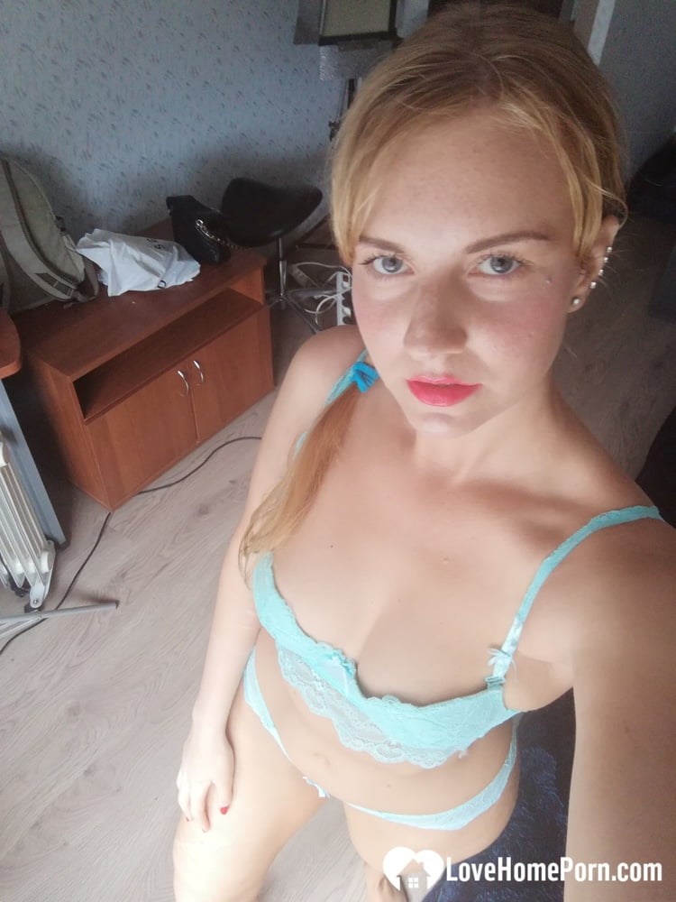 Beautiful amateur doll takes selfies while posing in her turquoise lingerie porn photo #426849641