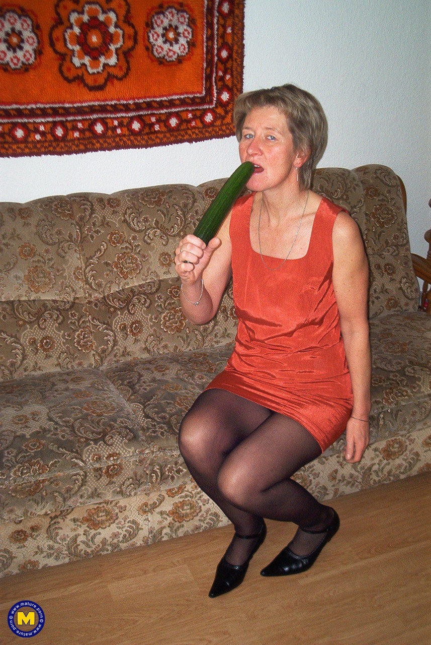 Housewife Christina Toying Her Horny Pussy With A Cucumber Pissing In A Bowl