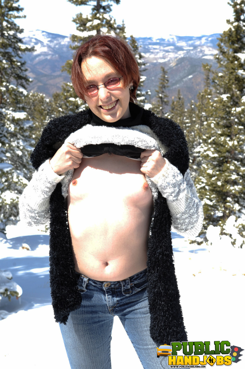 Naughty redhead Brandi de Lafey gives a snowman a CFNM handjob in the woods porn photo #422743147