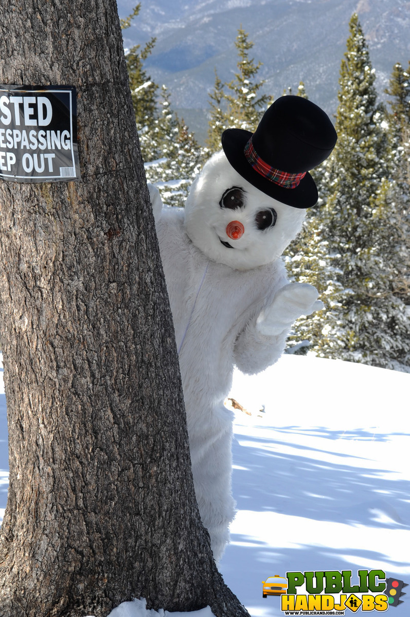 Naughty redhead Brandi de Lafey gives a snowman a CFNM handjob in the woods foto porno #422743152