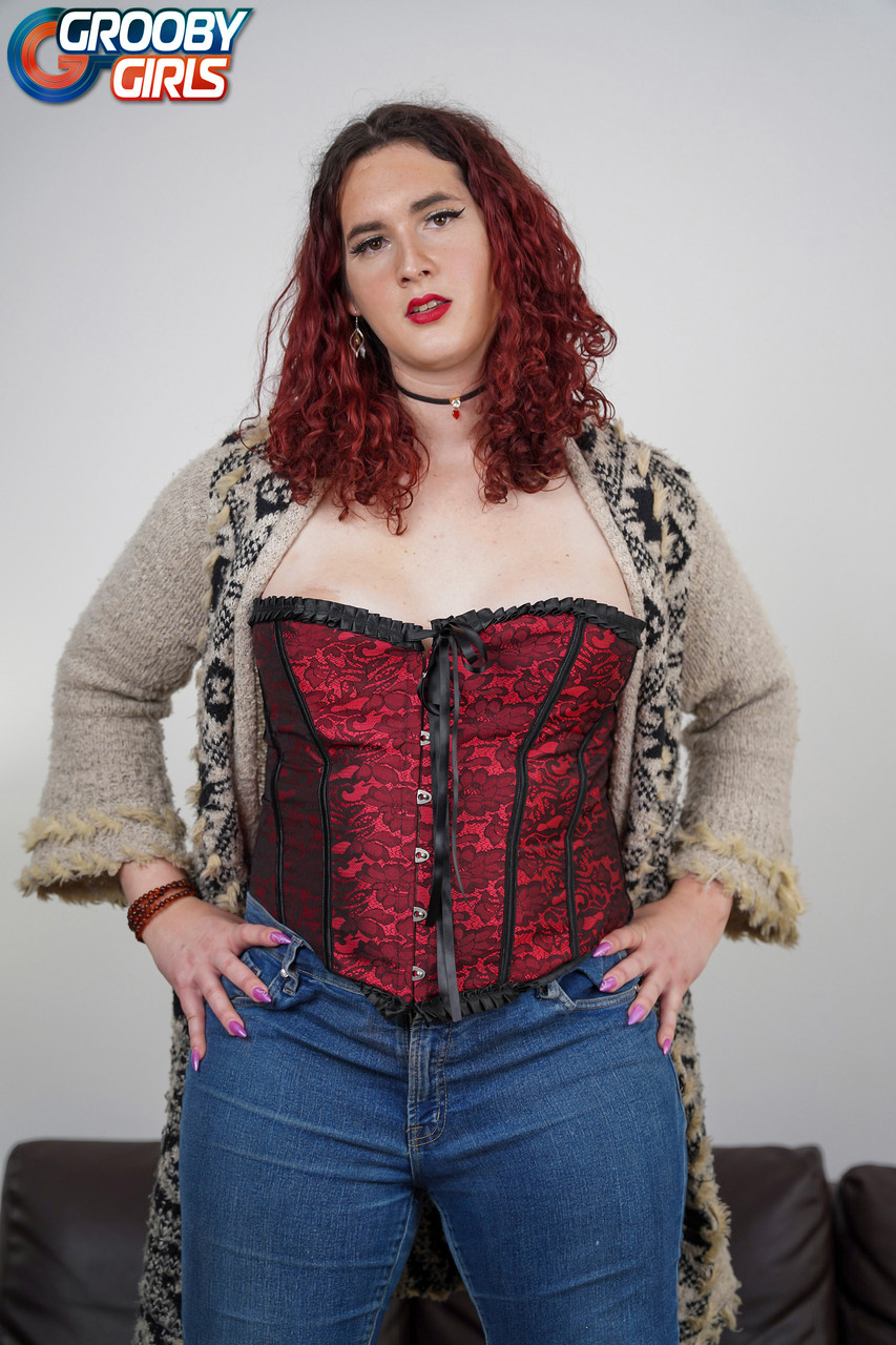 Curvy Redheaded Shemale Lily Fox Doffs Her Jeans And Shows Her Big Tits