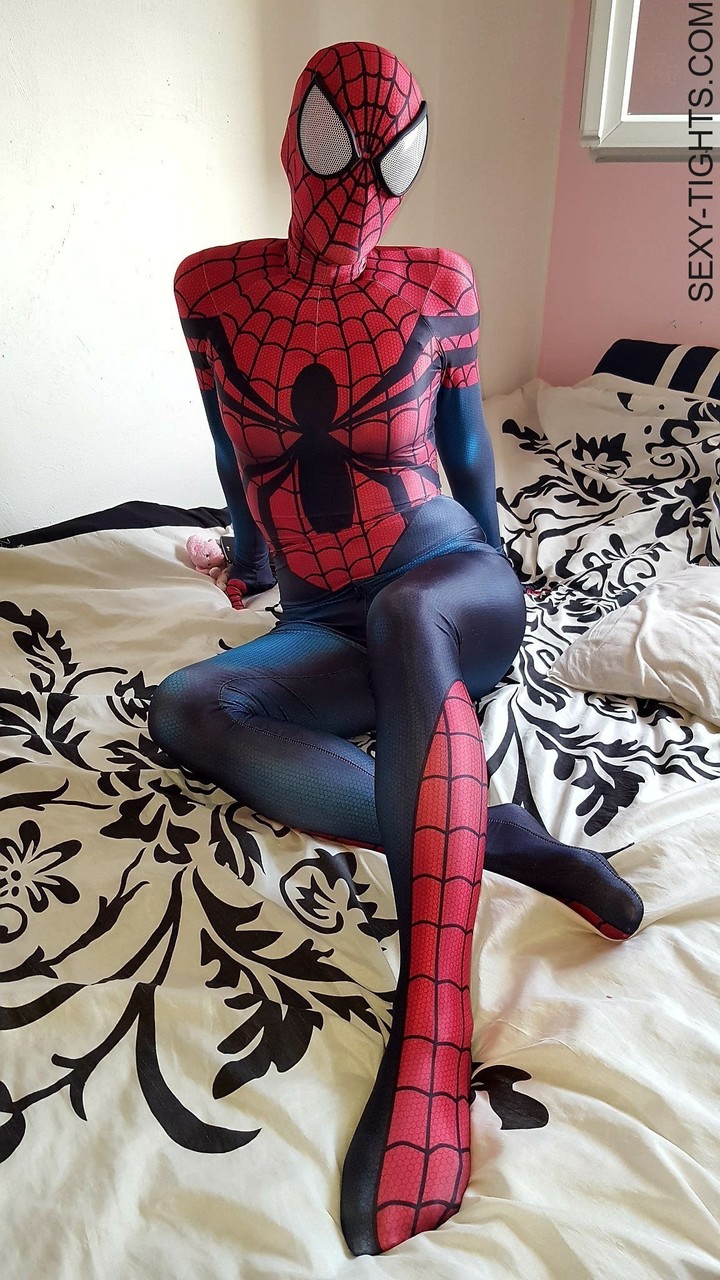 Cosplayer shows off her tight booty in a Spiderman costume on her bed porn photo #422703539