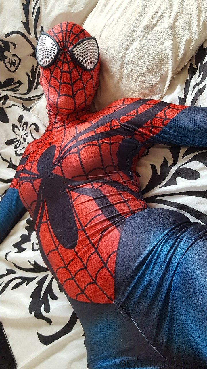 Cosplayer shows off her tight booty in a Spiderman costume on her bed porn photo #422703632