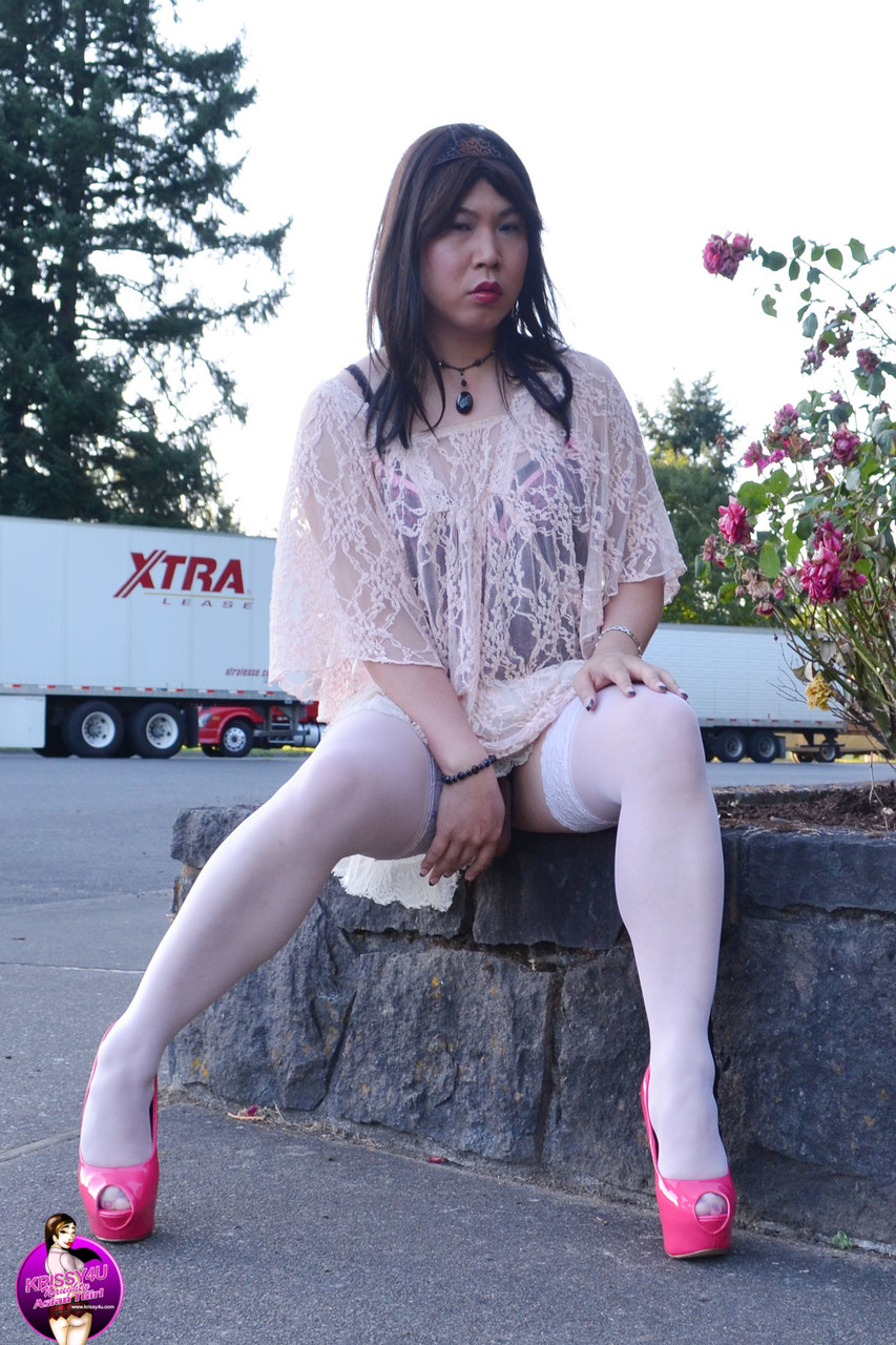 Slutty Asian shemale poses in a provocative outfit & high heels in public foto porno #427481784