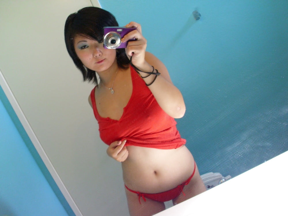 Amateur Asian Girl With Big Tits Takes Sexy Selfies In The Mirror