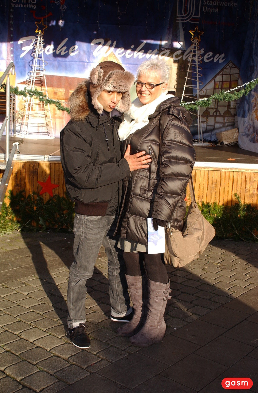 Short Haired German Housewife Flirts With A Young Man At The Christmas Market