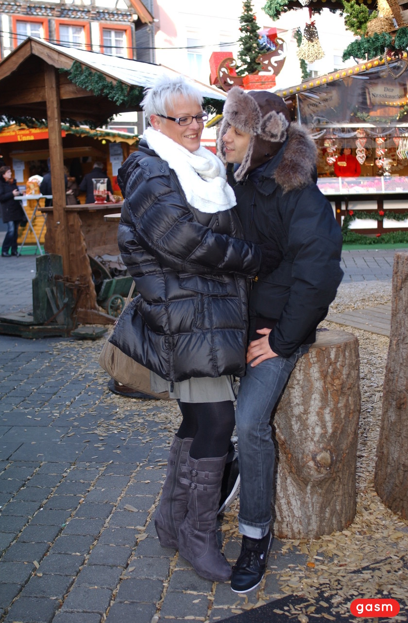 Short Haired German Housewife Flirts With A Young Man At The Christmas Market