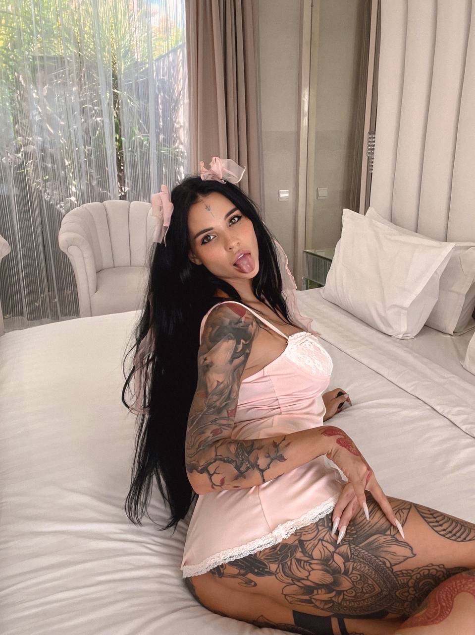 Tattooed Brunette Shows Off Her Big Boobs Her Great Ass On Her Bed