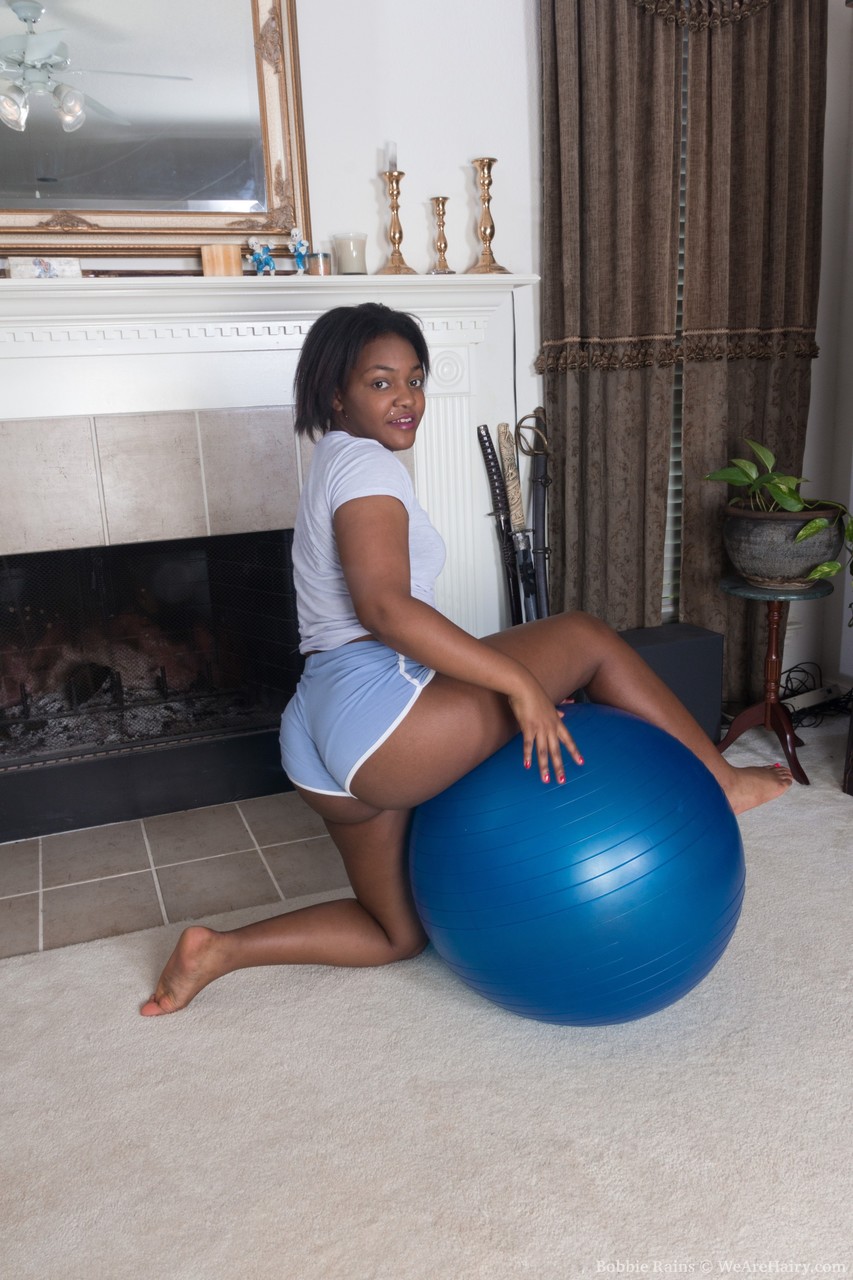 Black beauty Bobbie Rains fucks her hairy pussy with a dildo during a workout photo porno #426089874