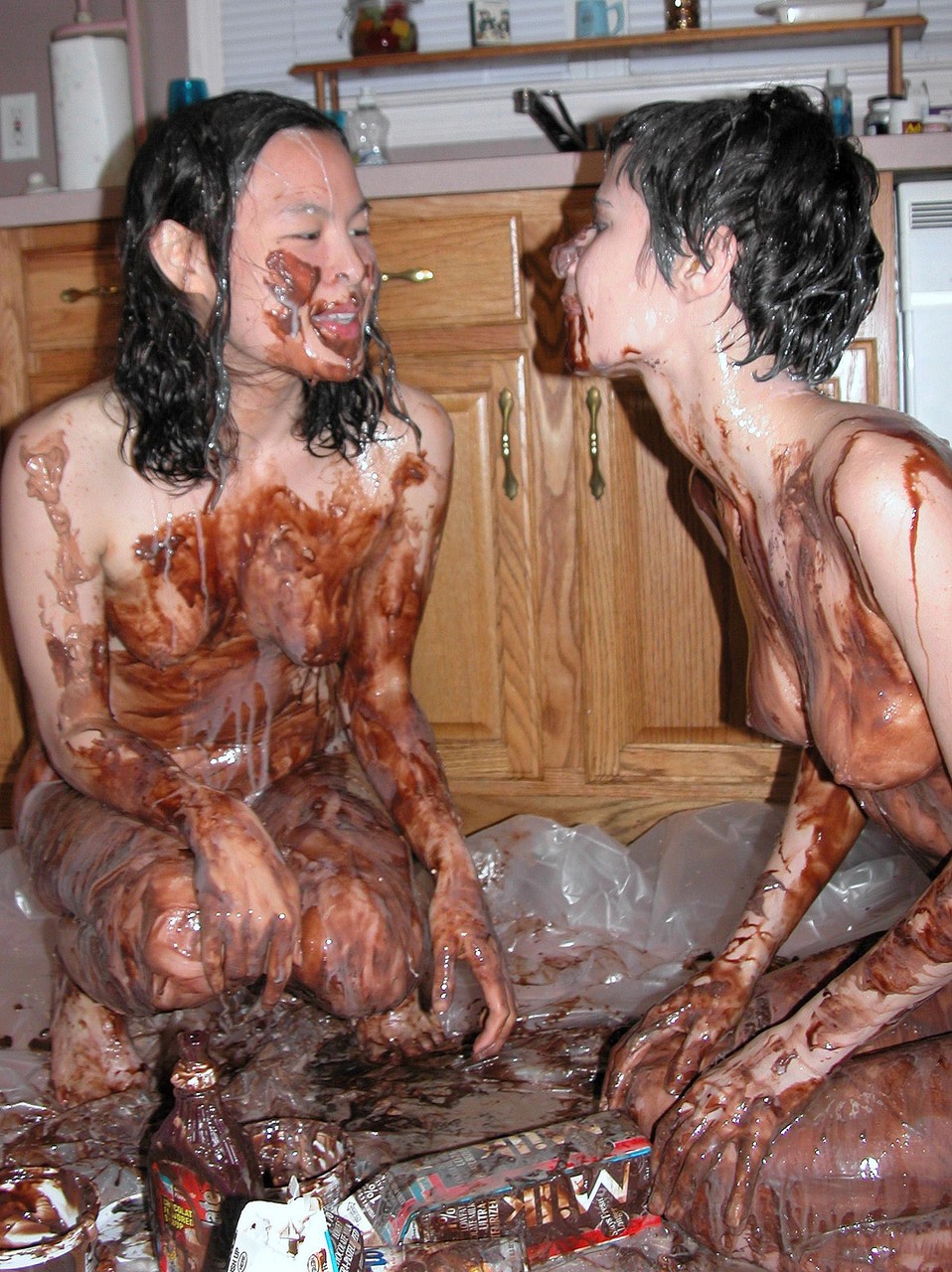 Playful Lesbians Colette Roxanne Cover Each Other's Bodies With A Chocolate