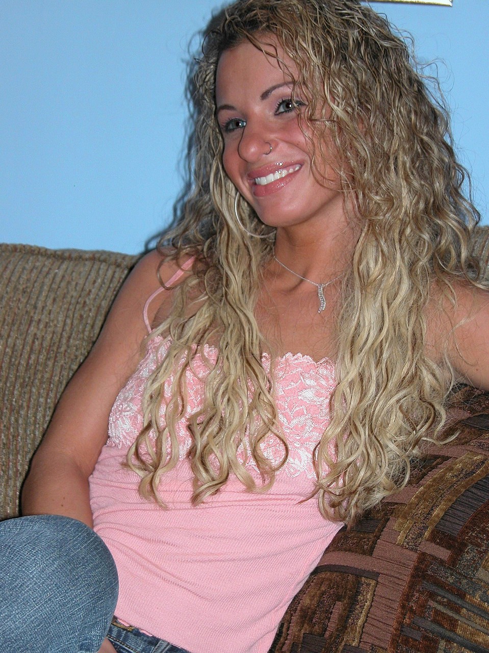 Slender Curly Haired Milf Holly Toys Her Tight Love Hole Up Close On The Sofa