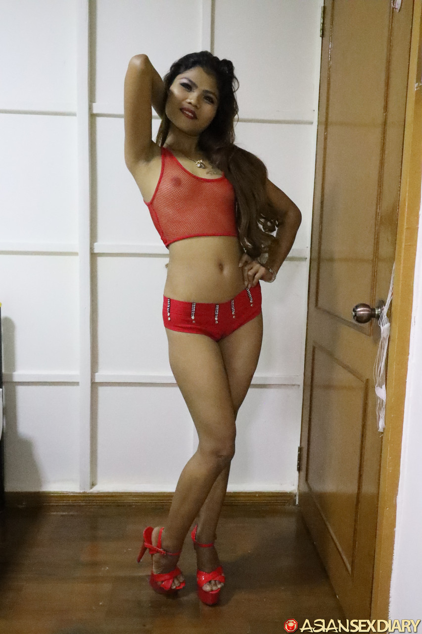 Cute Asian Girl May L Does A Sexy Striptease Wearing High Heels