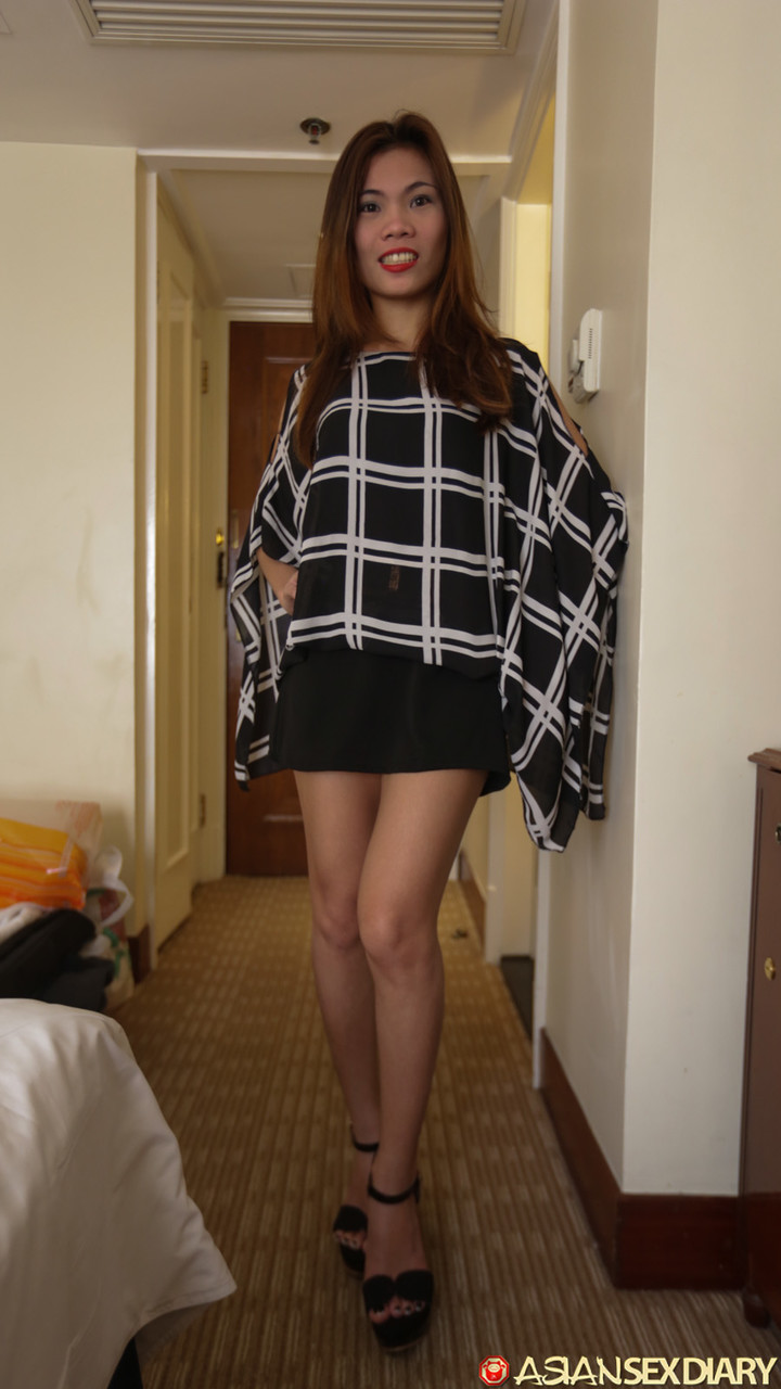 Slender Asian amateur: Shane shows off her good looks in a hotel room.