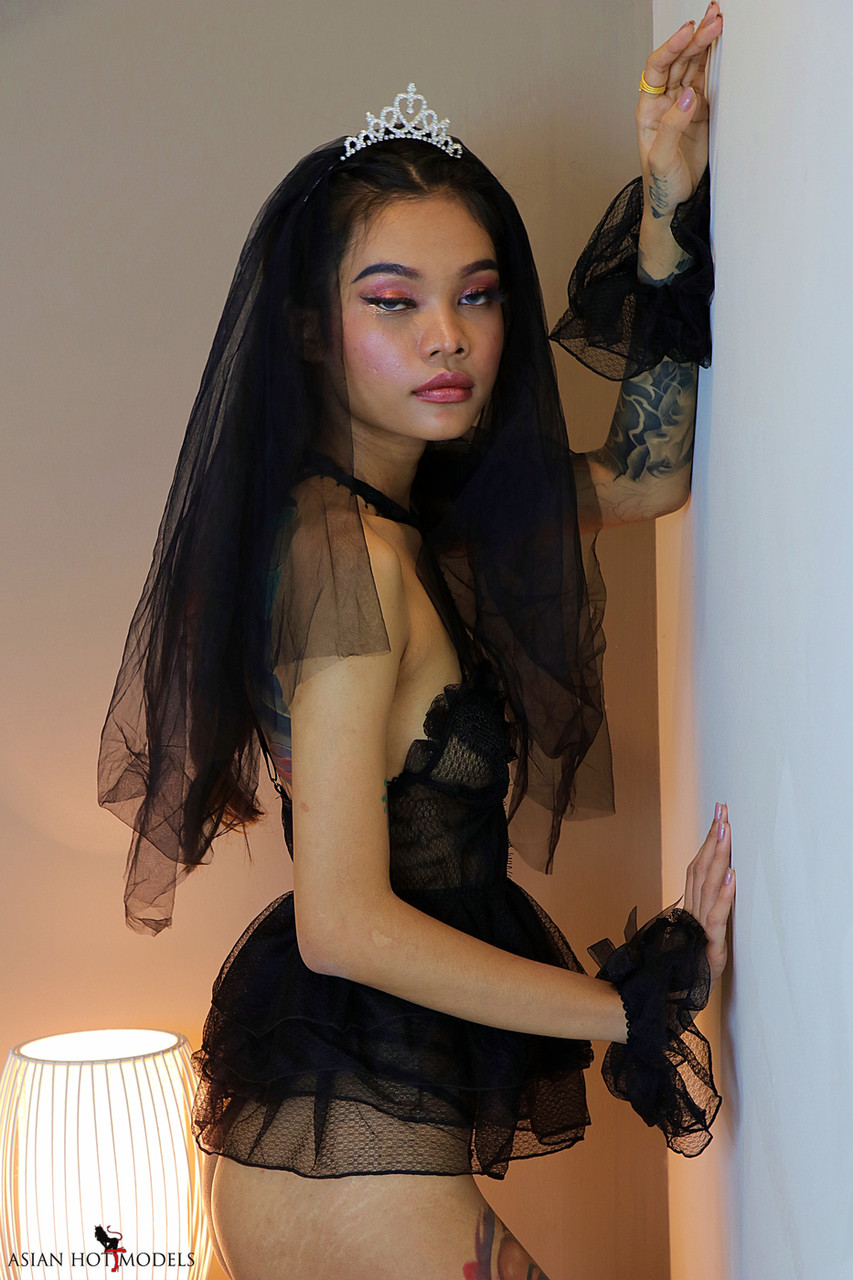Little Princess Nuchcy Poses In A Seductive Lingerie And Lacy Fishnets