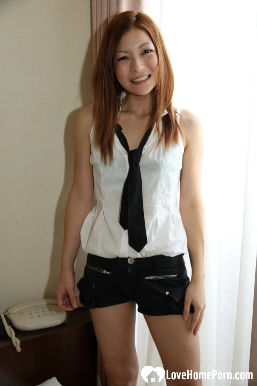 Hot Japanese Schoolgirl Doffs Her Sexy Uniform And Spreads Her Bushy Twat