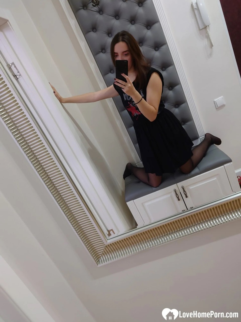 She exposes her petite frame in all the lingerie she has on, while also showing off her nude physique.