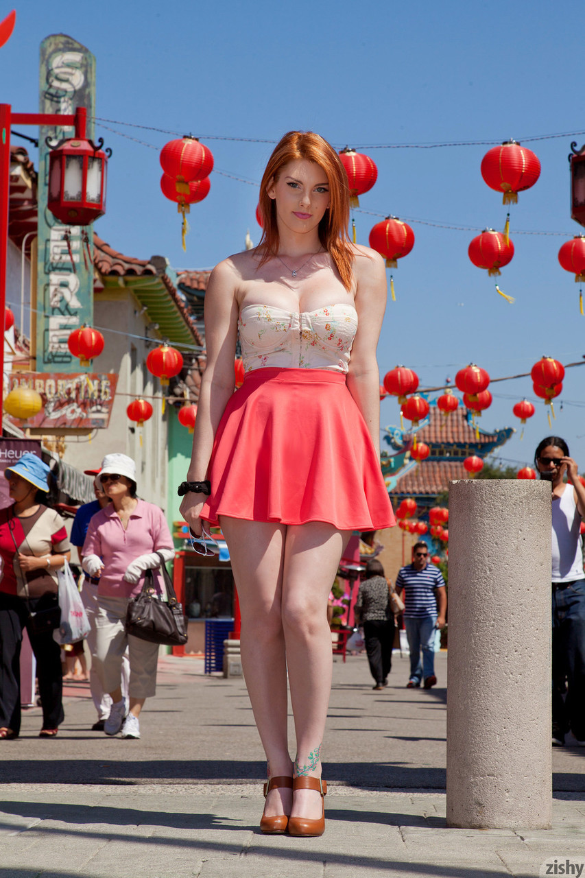 Stunning redhead Lilith Lust flashes her panties in daring Chinatown upskirt porn photo #422809113