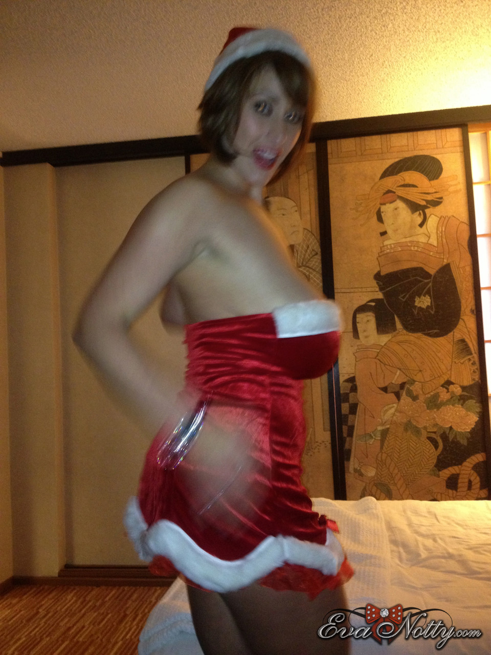 Cougar Eva Notty poses in her Xmas outfit before getting her huge tits jizzed foto porno #422913310