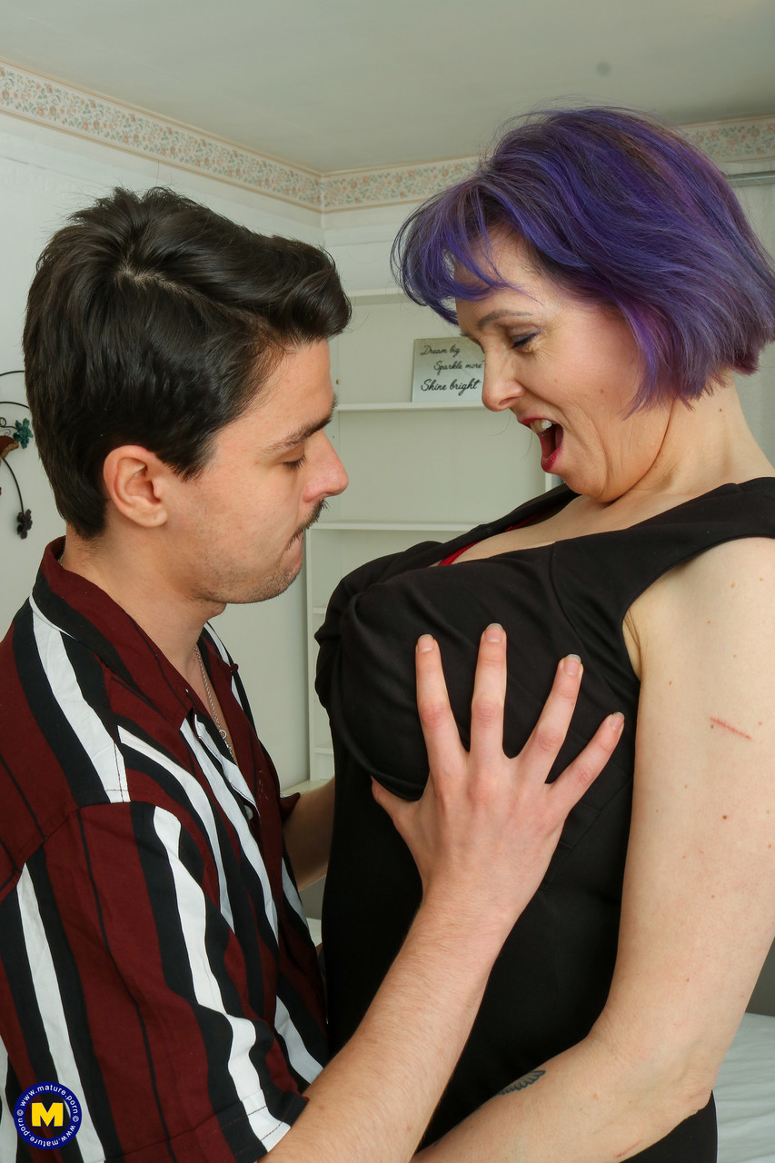 Purple-haired lady Tigger uses her big tits to wank a horny boy's dick & fucks photo porno #424012917