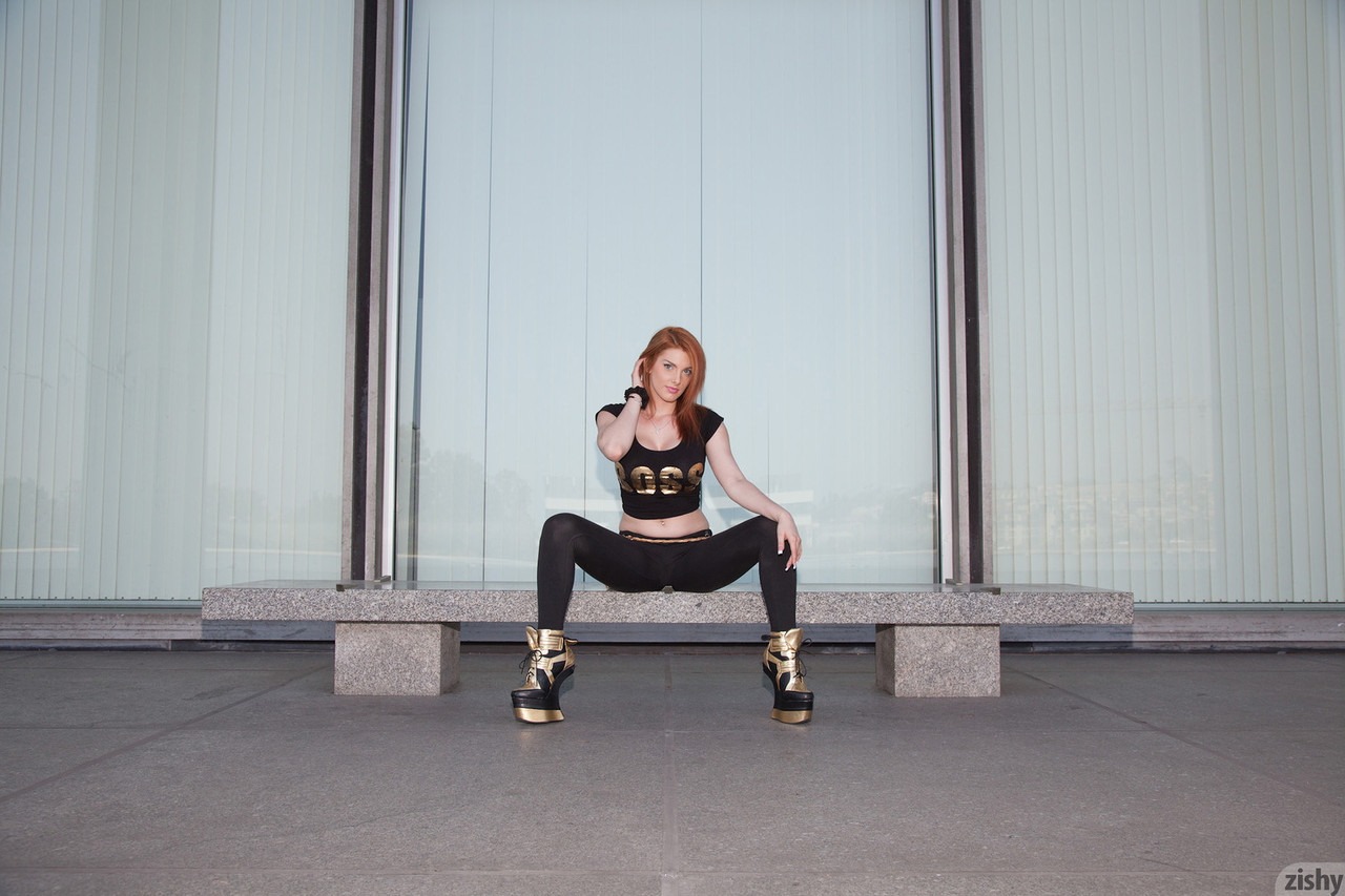 Redhead stunner Lilith Lust posing in sexy black leggings and heels in public foto porno #424756421