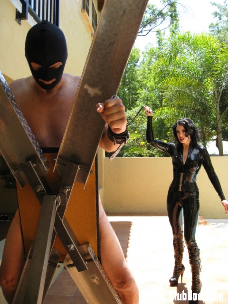Femdom in hot latex outfit Jean Bardot whipping her tied up slave's back foto porno #427852438