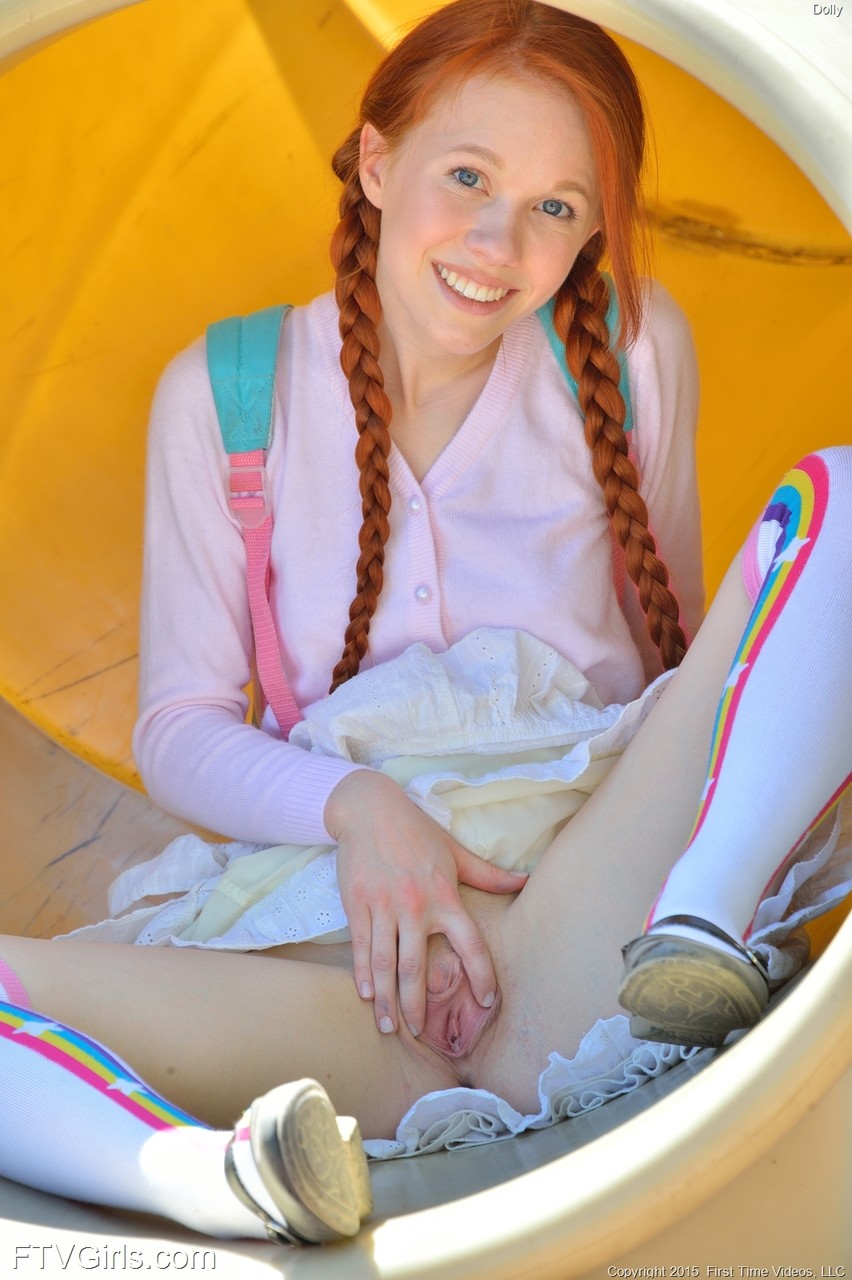 Short redheaded schoolgirl Dolly giving a pantyless upskirt in public porn photo #423782153