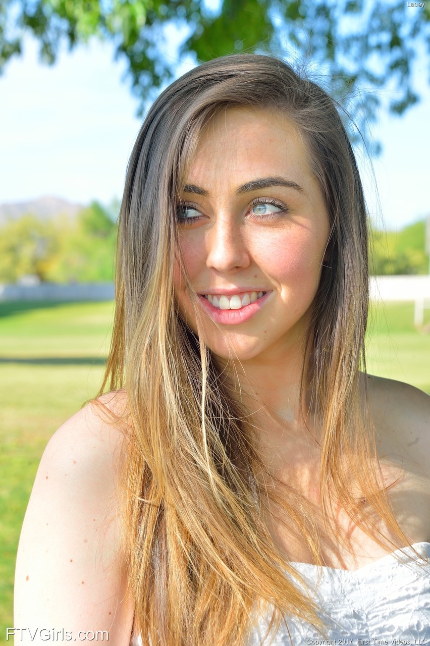 Sweet teen with lusty eyes Lacey flashes her cunt while posing in the park porn photo #427439781