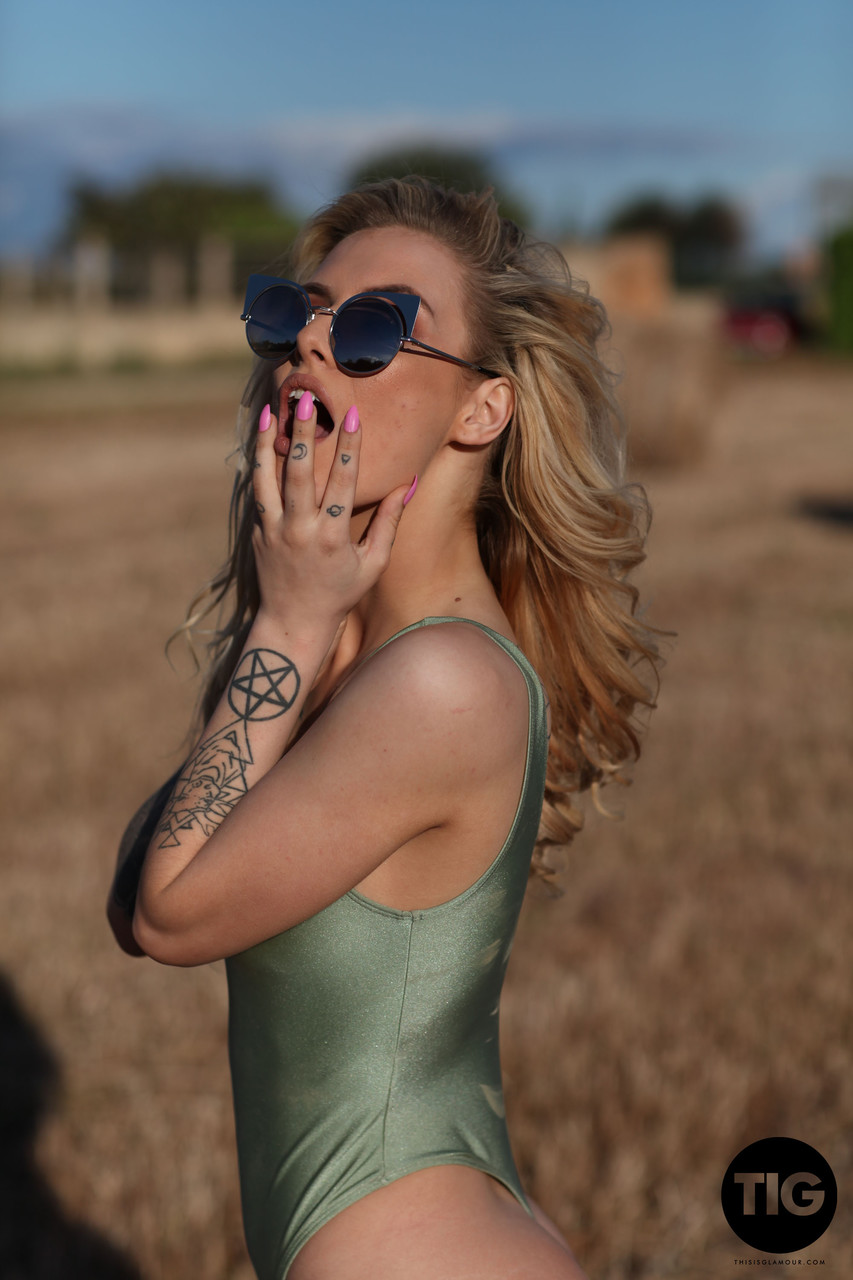 Blonde model with tattoos Saskia Valentine shows her fine breasts outdoors foto porno #428444859